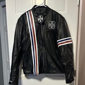 West Coast Choppers Black Leather Motorcycle with Red, White, and Blue Accents